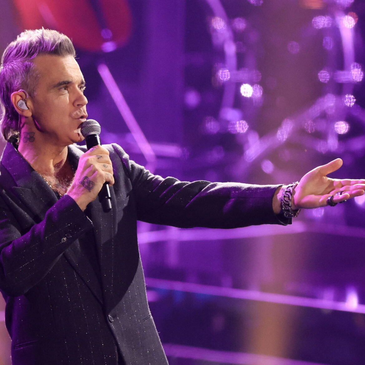 Robbie Williams: A Journey Through His Iconic Career