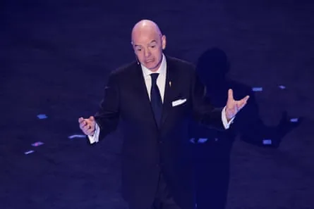 Gianni Infantino gesturing with arms spread wide